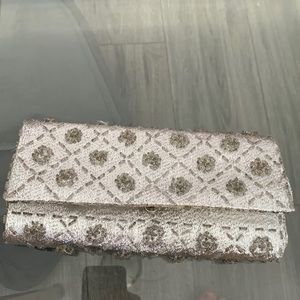 Silver beaded clutch